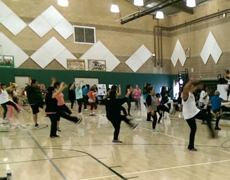 Enhancing Forward Action Inc. image of a group yoga