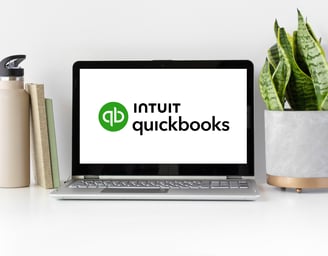 Laptop displaying the QuickBooks logo, representing expert QuickBooks setup for small businesses.