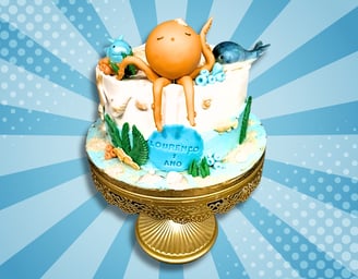pacote de festa bolos de sonho a cake with a crabfish on top of it