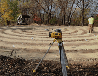 a man standing in a circular maze maze maze