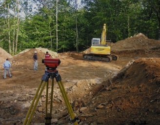 a man standing in front of a construction site