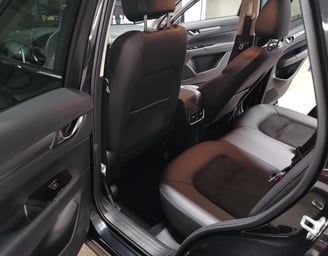 Interior Detailing Image “Deep interior car detailing with steam cleaning and vacuuming of seats"