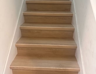 Professional flooring installation in Central Florida home with premium vinyl planks, moisture barri