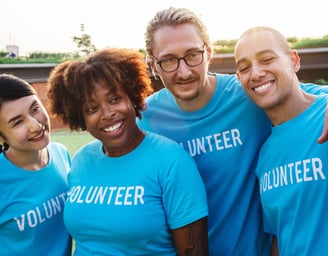 FAIF Foundation volunteers showing unity at a mental health awareness event in Louisville