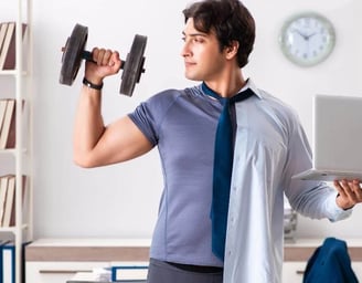 a corporate employee exercising in office