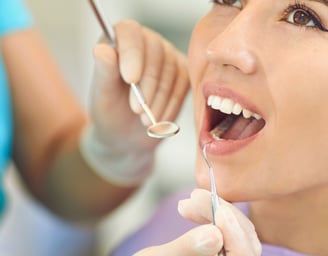 An experienced dentist in Greater Noida performing professional dental care, ensuring healthy teeth
