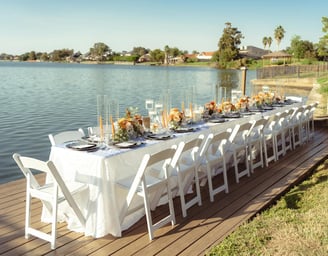 a long table with a long table set up for a dinner