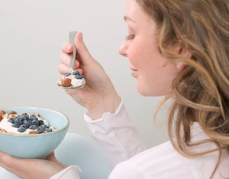 woman eating a Nutritious Breakfast