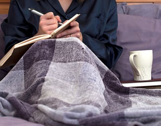 woman reflective journaling