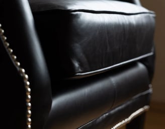 black leather armchair with decorative nails