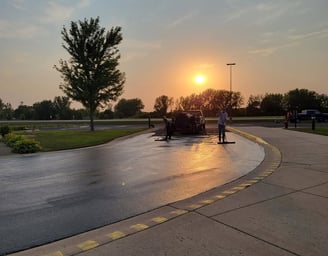 e-and-h-asphalt-crew-working-on-a-seal-coating-project.jpg
