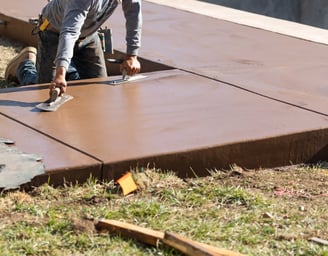 a man is using a sanded in concrete