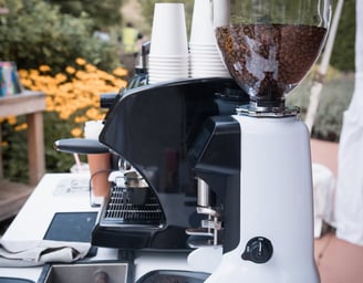 Mobile coffee service at an outdoor fundraiser with Ancestral on Wheels espresso cart.