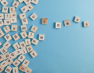 letter tiles spelling the word 'success'