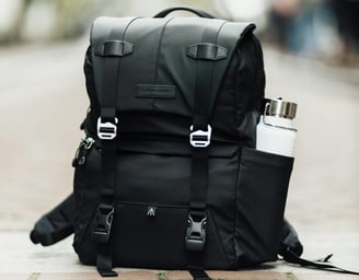 a backpacker's backpacker with a water bottle