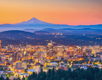 Portland skyline with Mt. Hood, showcasing Platen Media’s reach across Oregon.