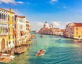A relaxing morning overlooking the Grand Canal and admiring the boats in Venice, Italy