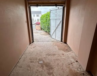 Plastered wall with a fine, smooth texture.