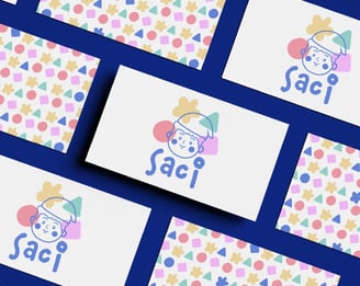 Frente e verso de cartão de visitas com elementos coloridos de hospital pediátrico