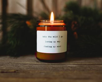 a candle with a candle in a candle holder