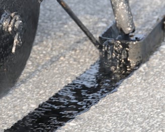 The Science Behind Effective Crack Sealing - Chattahoochee Valley Sealcoating