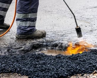 Long lasting pothole repairs by Chattahoochee Valley Sealcoating for Newnan, Georgia