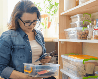 Women looking at seed packets.