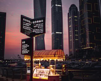 a food truck parked in front of a building Dubai street food