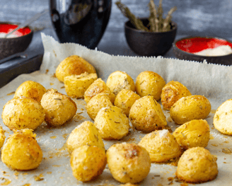 a tray of garlic parmesan roasted potatoes