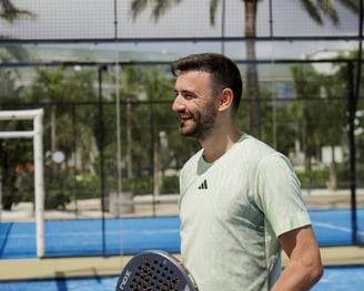 man playing padel on padel retreat