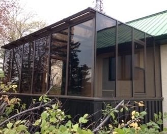 Square Eave Solarium or Lean-to solarium with pony wall and brown color.