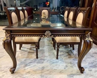 a dining room table with a glass top