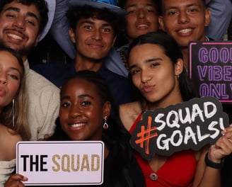 Group of teenagers posing for a photo booth photograph