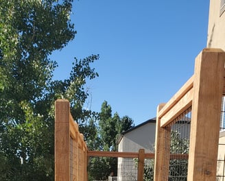 a wooden deck with a wooden deck and stairs