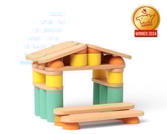 The house is built using colored silicone and wooden parts of the educational game