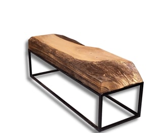 a bench with big wooden trunk accent