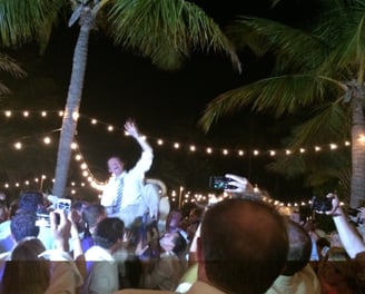 Groom gets on Chair for Hora - Outdoor Wedding Dj