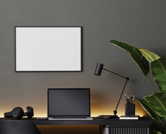 modern office space with white board and lap top 