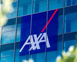 a large blue and white sign that says axa
