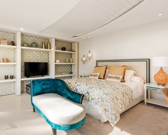Guest room in the guest house of Villa El Rincon, Marbella, featuring stunning garden and sea views.