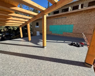 New construction house with vinyl decking over living space