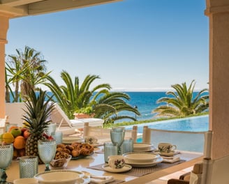 Pool area at Villa El Rincon, a luxury beachfront villa in Marbella.