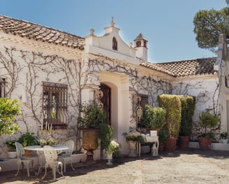 Ivy-covered entrance of Finca Santa Katerina