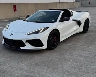 Rear view of 2023 Corvette 3LT with white paint and black trim