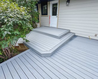 A boxed in composite deck with stairs
