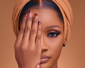 a woman with a turban and a head scarf