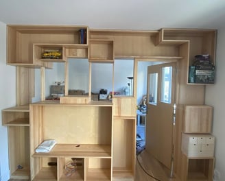 a room with a desk and a desk with a computer