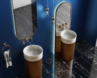 a bathroom with a blue tiled wall and a mirror