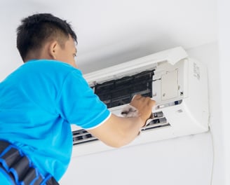 Air Condition Technician Repairing Aircon SYstem