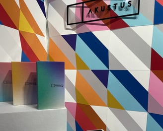 bright multicolored facets on 3D acoustic quartz wall panels by AKUSTUS at icff